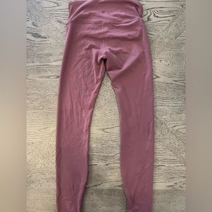 Size 6 rose colored 7/8 Lululemon leggings in Nulu. Fold over waistband